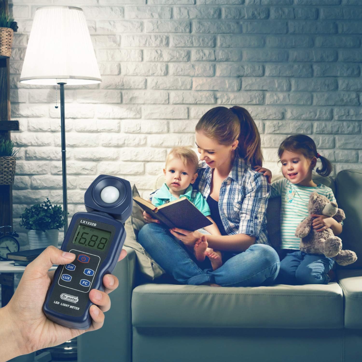 Digital light meter measuring PAR levels in an indoor grow tent with LED grow lights